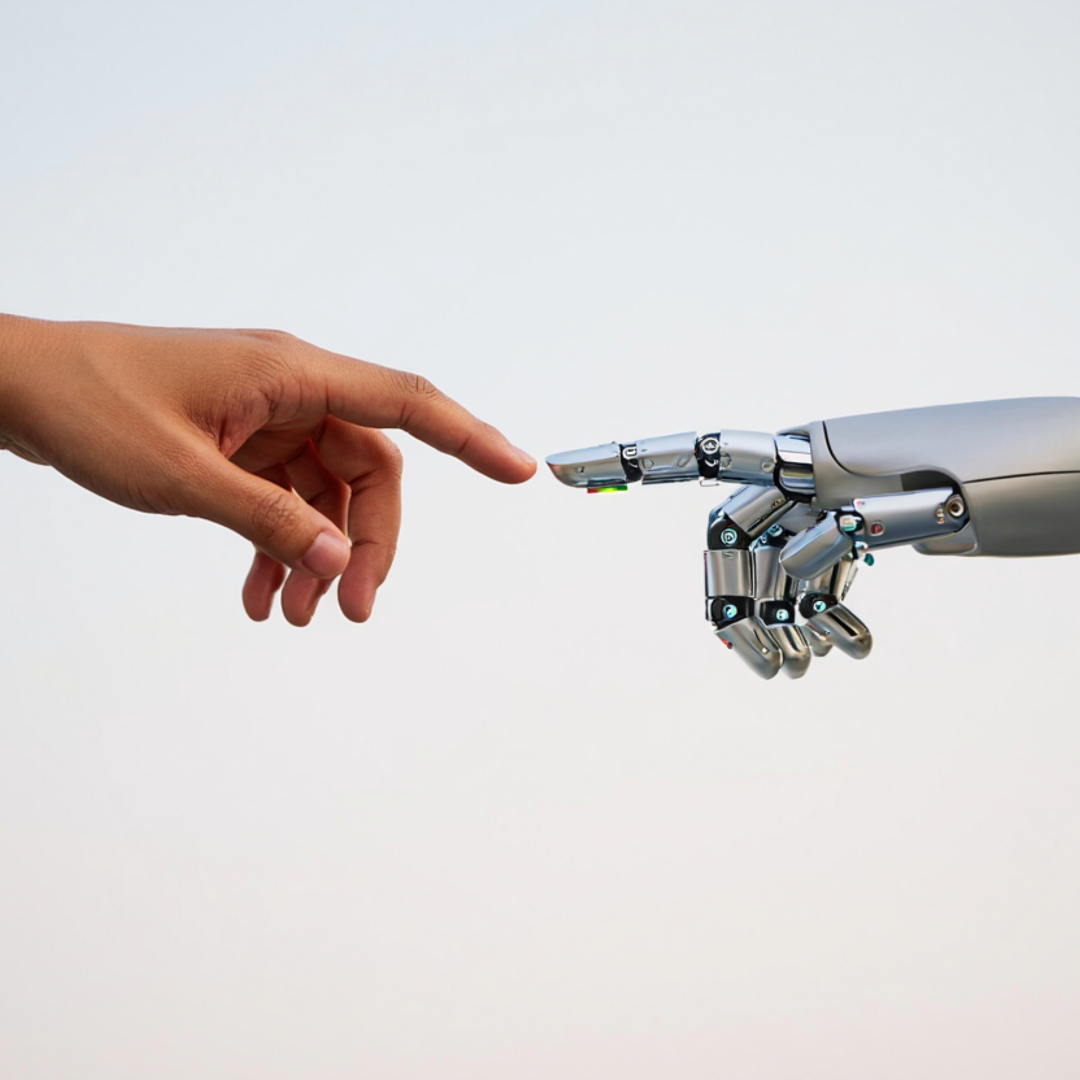 Une main humaine et une main robotique qui se rejoignent